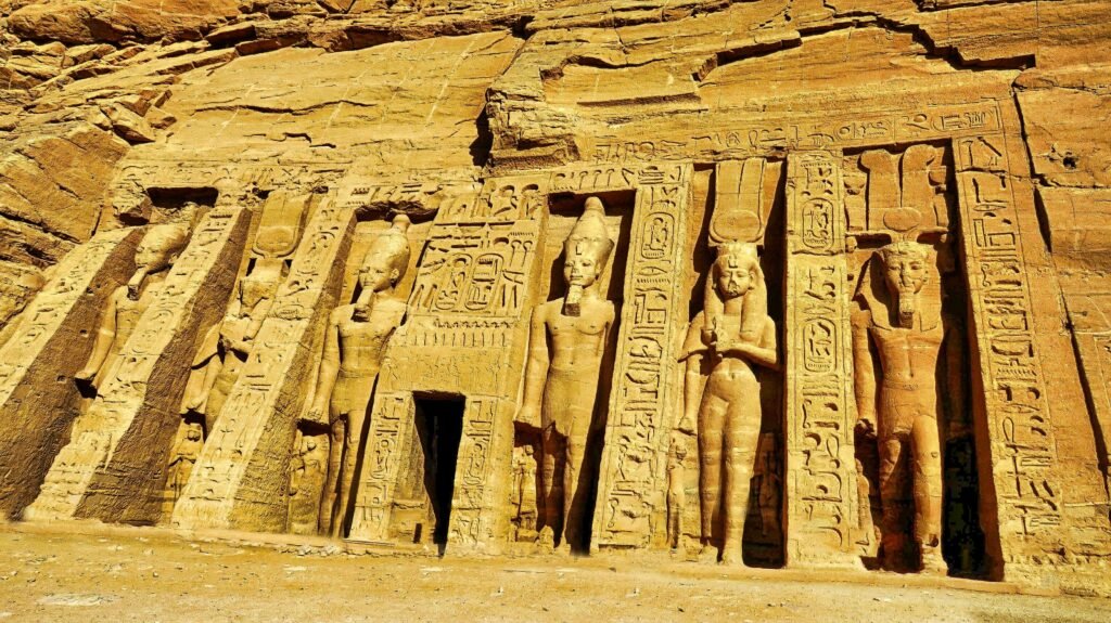 Detailed carvings on the Abu Simbel temple showcasing ancient Egyptian artistry.